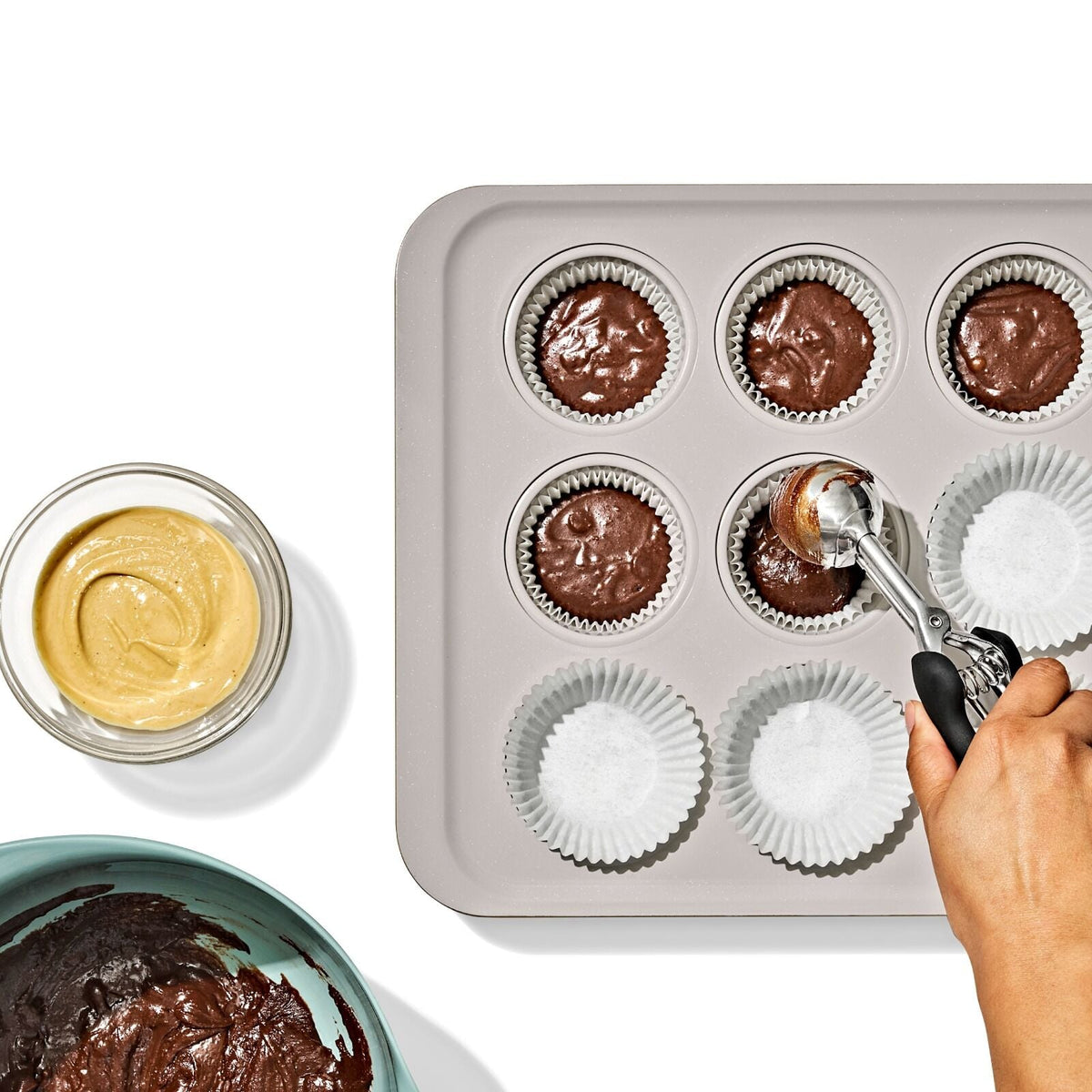 non-stick-pro-ceramic-coated-metal-bakeware-12-cup-muffin-pan-storm-blue-q5 oxo_12-cup-muffin-pan_pdp_03.jpg