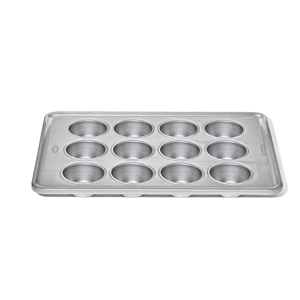 non-stick-pro-clear-coated-12-cup-muffin-pan-q0 gg_11435600_12-cup-muffin-pan_apdp_00_main.jpeg