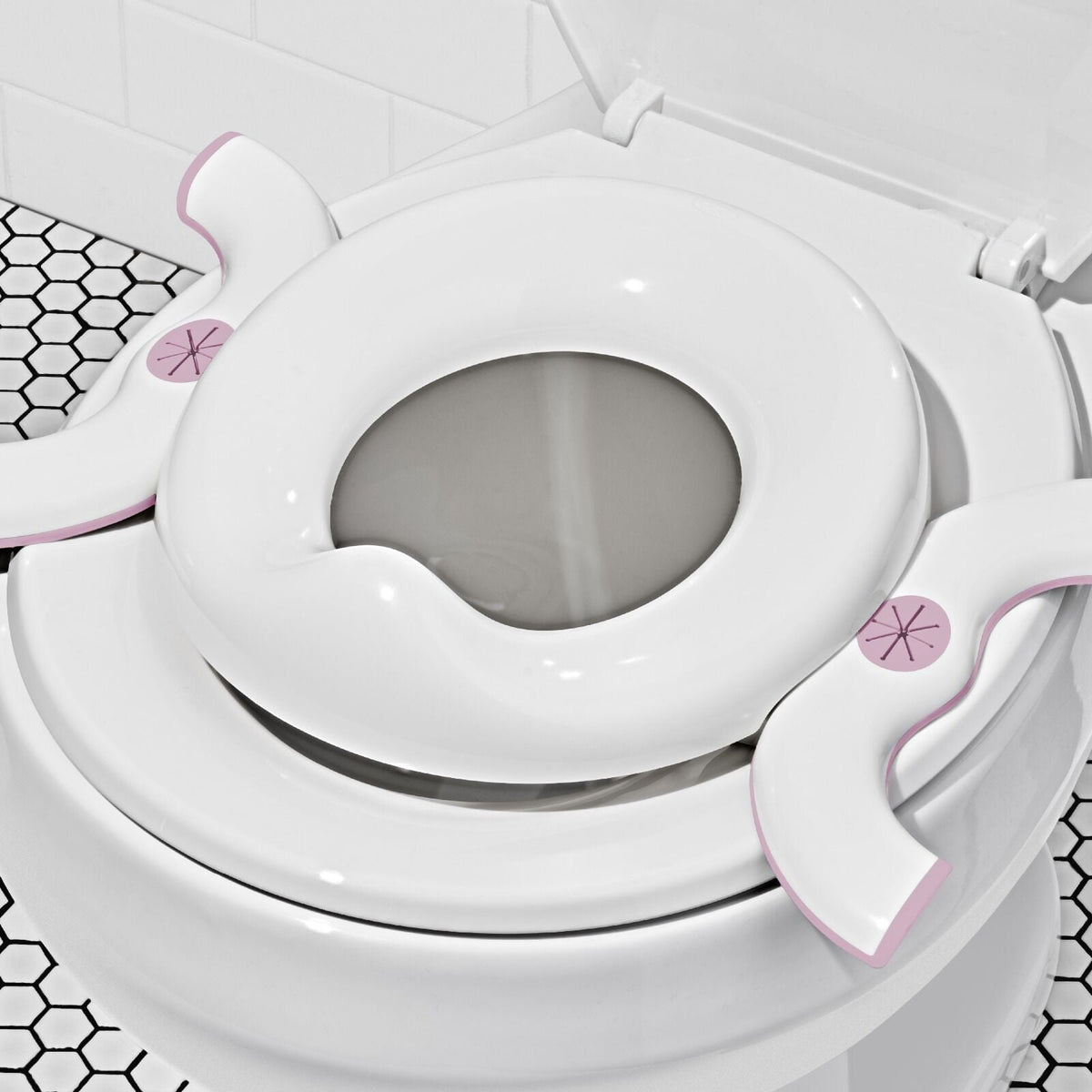oxo-tot-2-in-1-go-potty-blossom-i8 tot_63172200_2in1-go-potty-blossom_pdp_03.jpeg